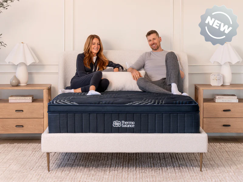 Couple trying a mattress at Noah's Mattress Express showroom in Sanford, Florida